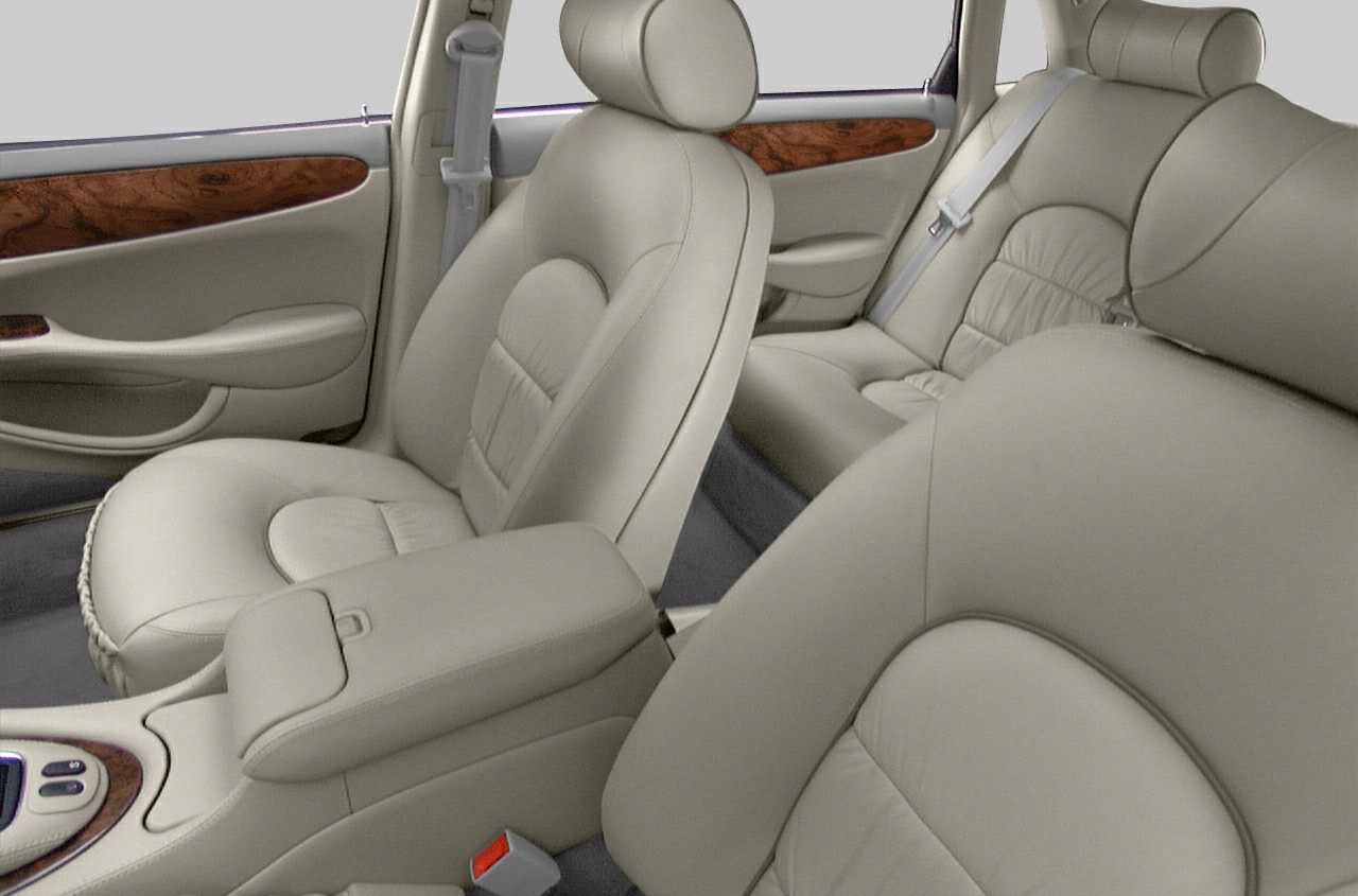 Beige leather seats with wood trim interior elements