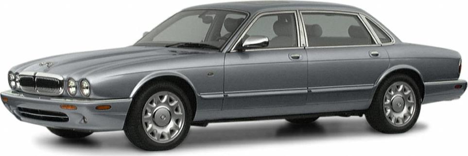 Luxury sedan with classic rounded headlights and chrome grille