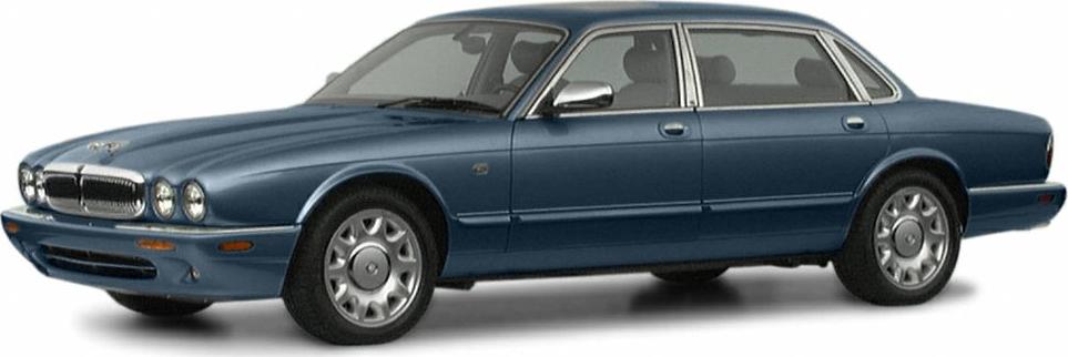 Sleek classic luxury sedan with prominent round headlights and elegant alloy wheels