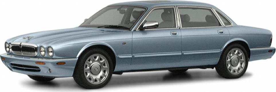 Side profile of classic luxury sedan with alloy wheels
