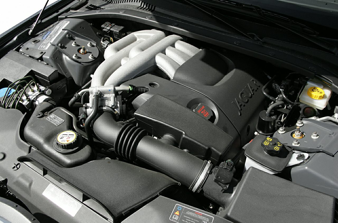 Close-up of engine bay with intake manifold and components