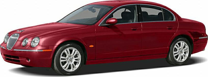 Red four-door sedan with smooth curves and classic design