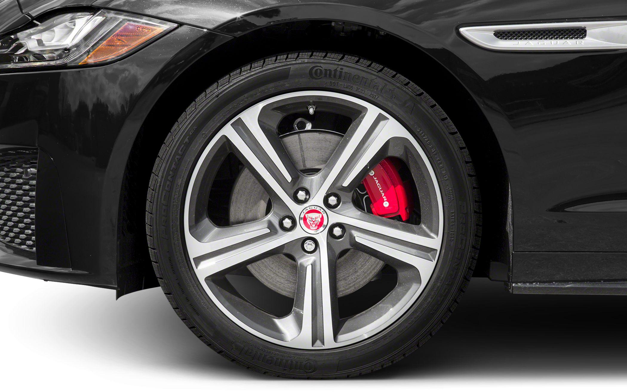 Front alloy wheel with red brake caliper and Continental tire