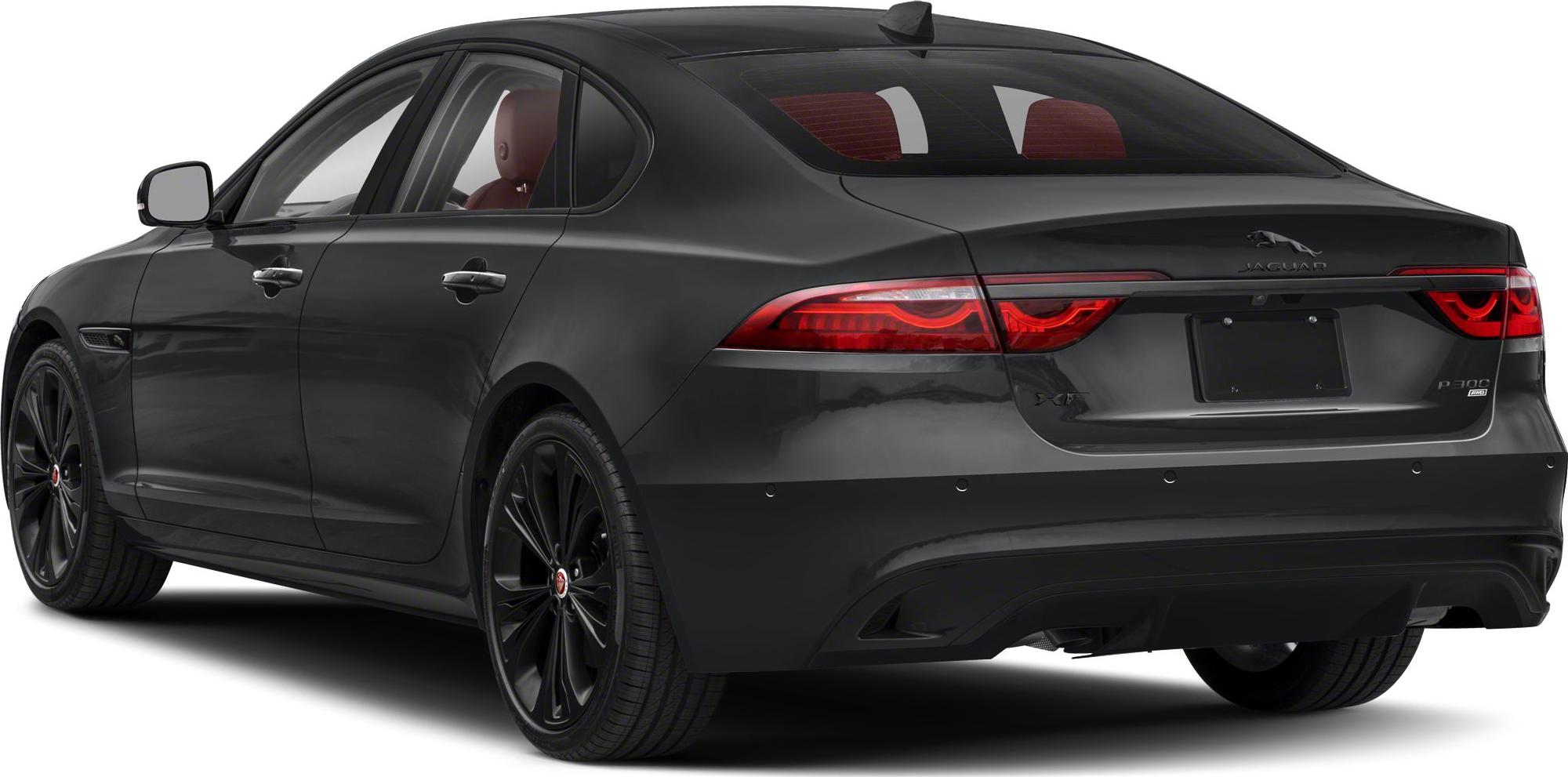 Rear side view of sleek luxury sedan with distinctive tail lights and black alloy wheels.
