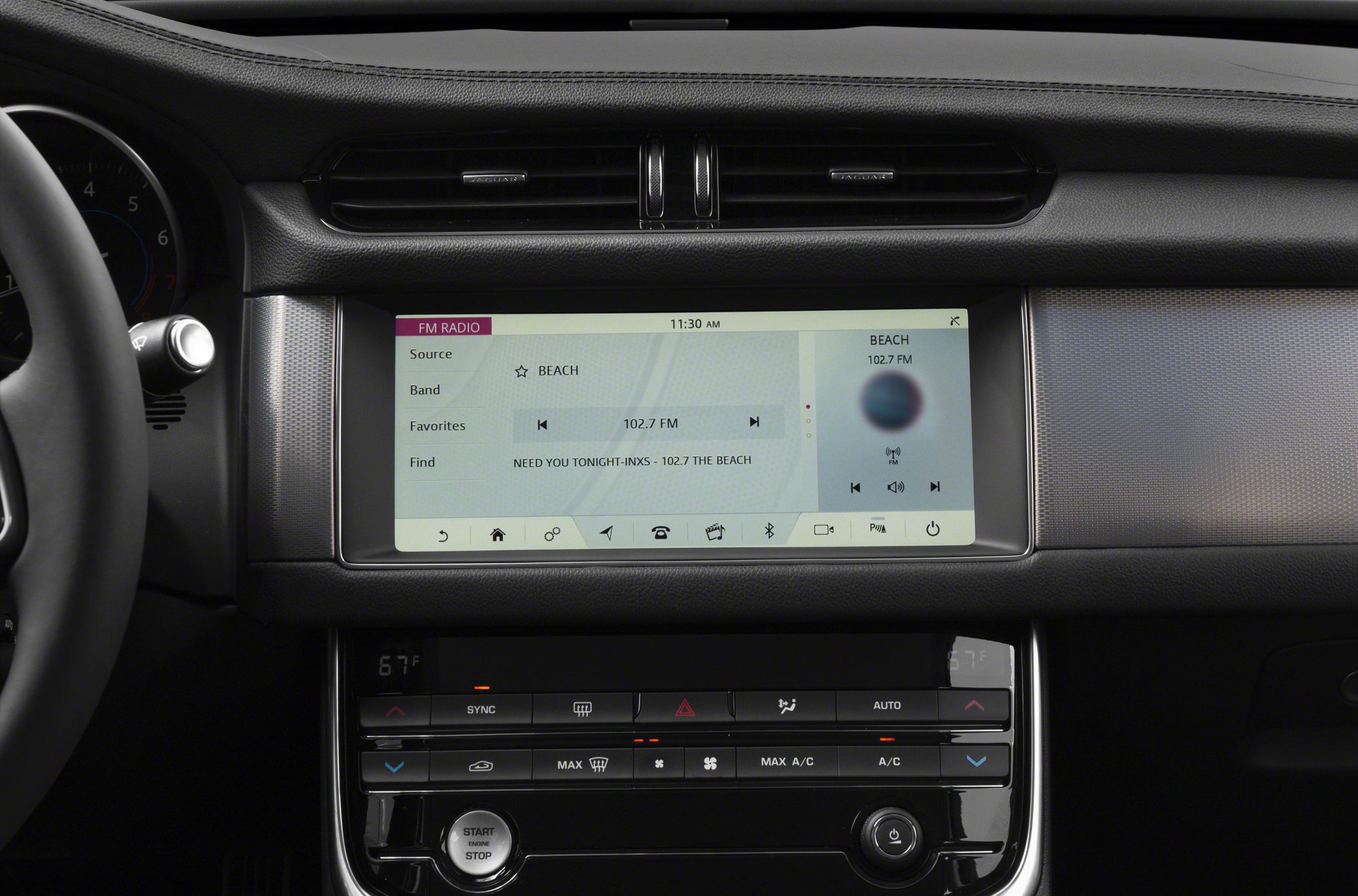 Touchscreen infotainment display with FM radio and digital climate controls