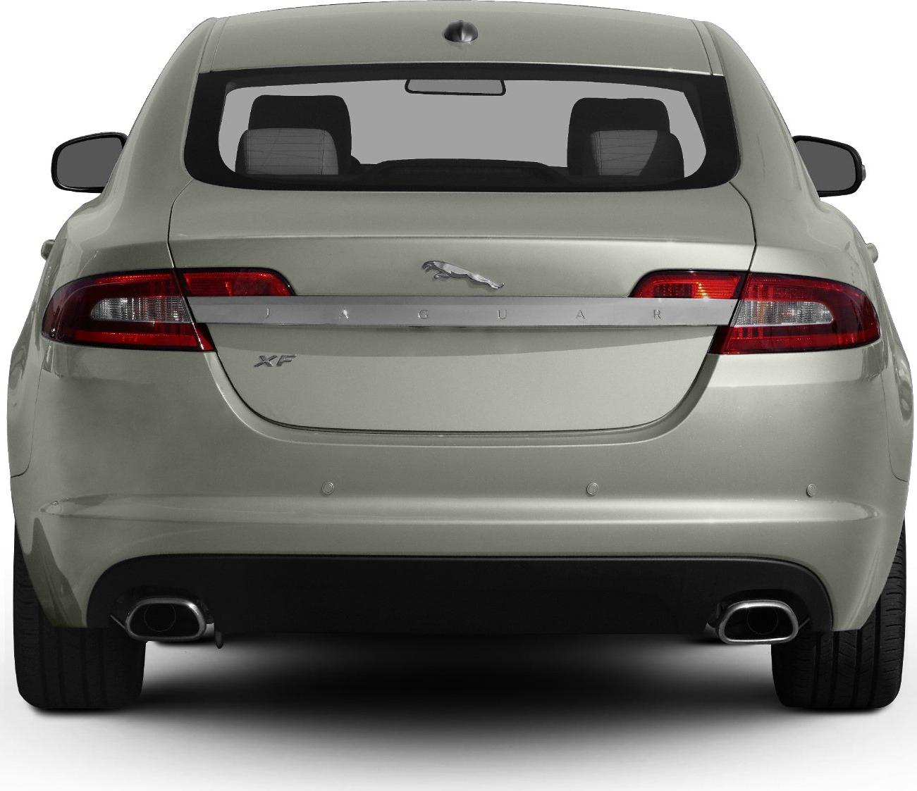 Rear view with tail lights, badge strip, and dual exhausts
