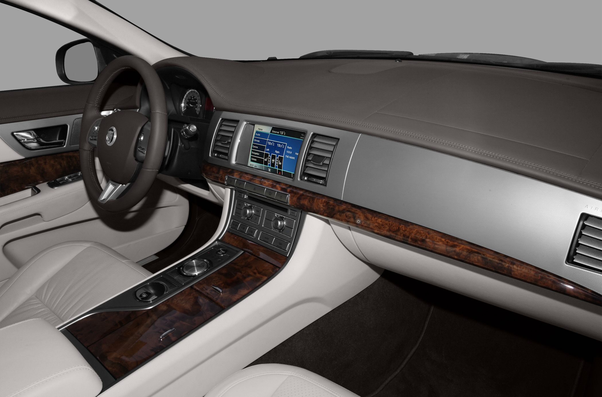 Luxury car interior with wood accents and infotainment display
