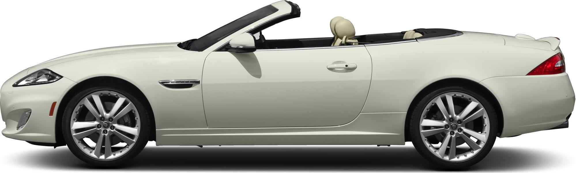 Side profile of a luxury convertible with open roof and alloy wheels