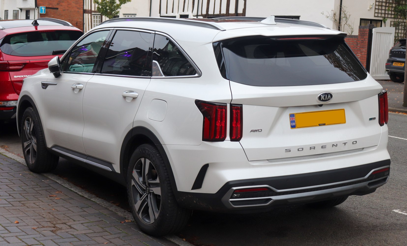 Rear and side view of SUV with vertical tail lights and sleek profile