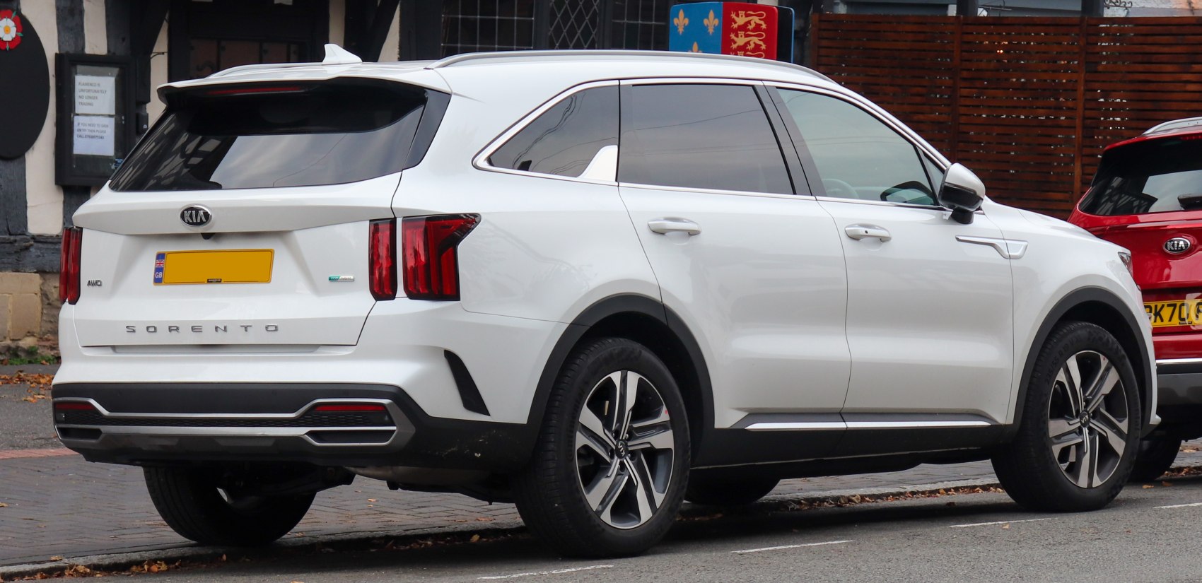 Rear and side view with distinctive vertical taillights and alloy wheels