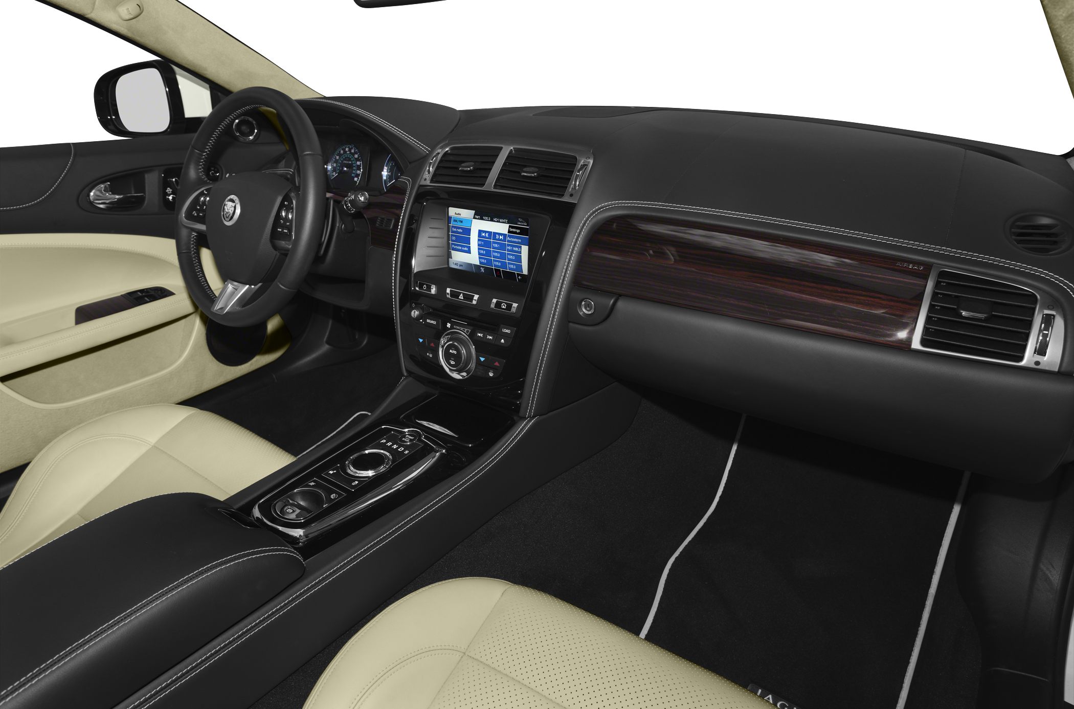 Luxury convertible interior with leather seats, wood trim, and touchscreen infotainment