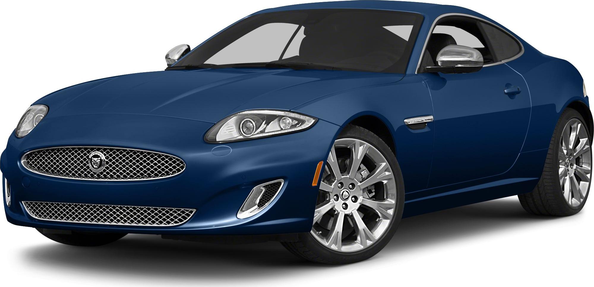 Front view of sports coupe with oval mesh grille and alloy wheels