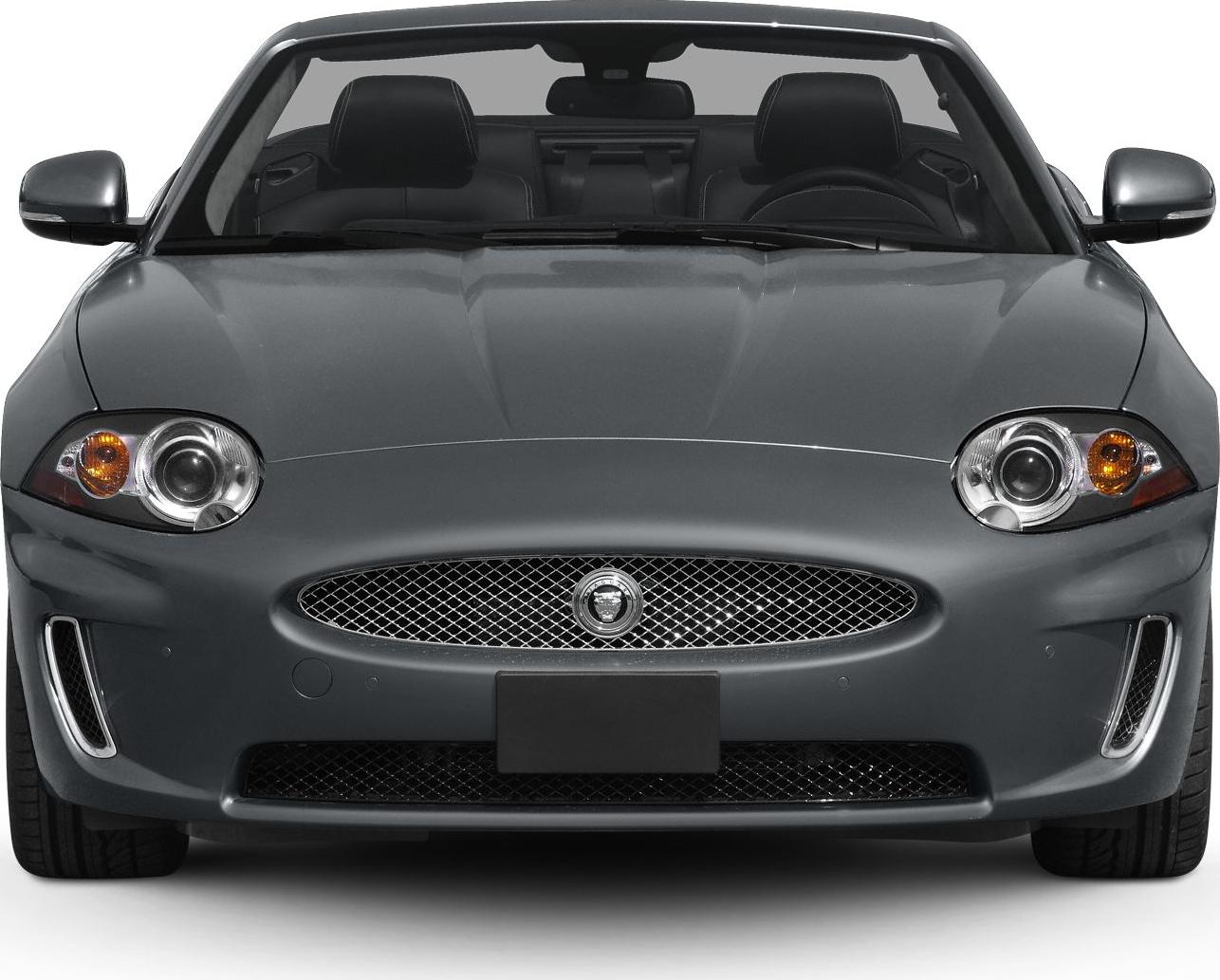 Front grille and headlamps of a luxury convertible roadster.