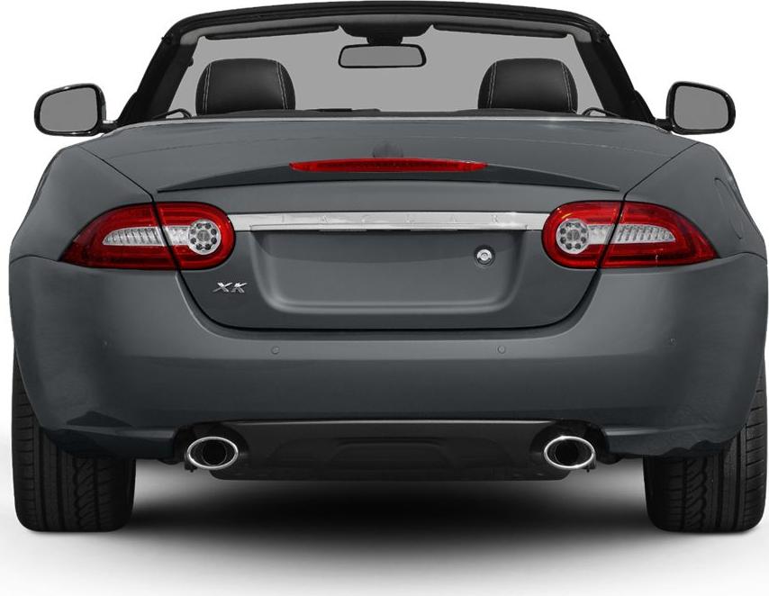 Rear view with distinct taillights, dual exhausts, and open convertible top