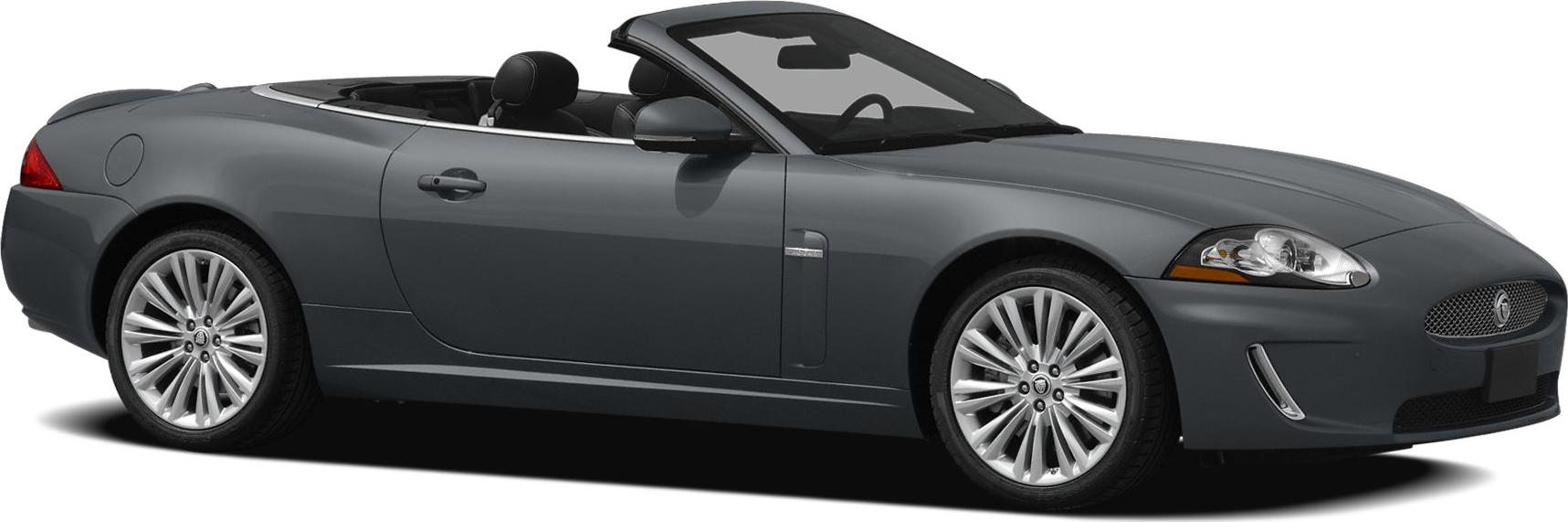 Side profile of sleek convertible with alloy wheels and open roof