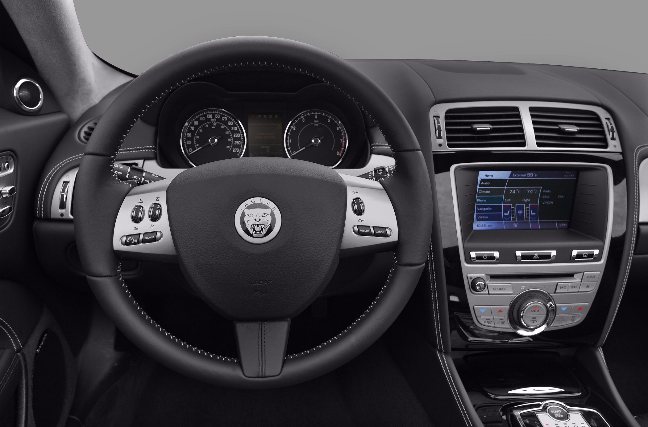Steering wheel and dashboard with digital instruments and infotainment system