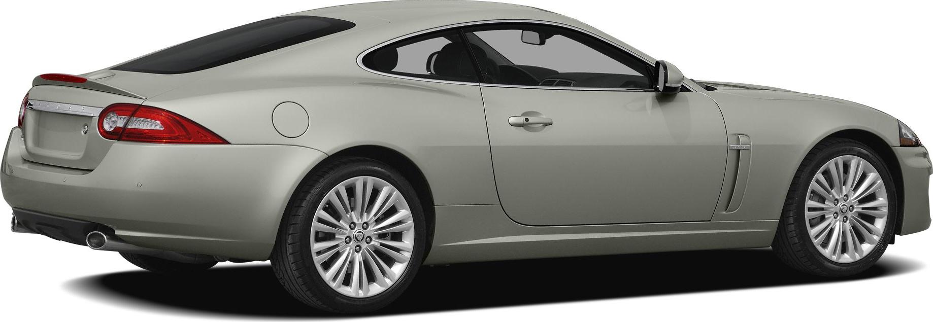 Rear side profile of sleek coupe with alloy wheels and rear exhaust