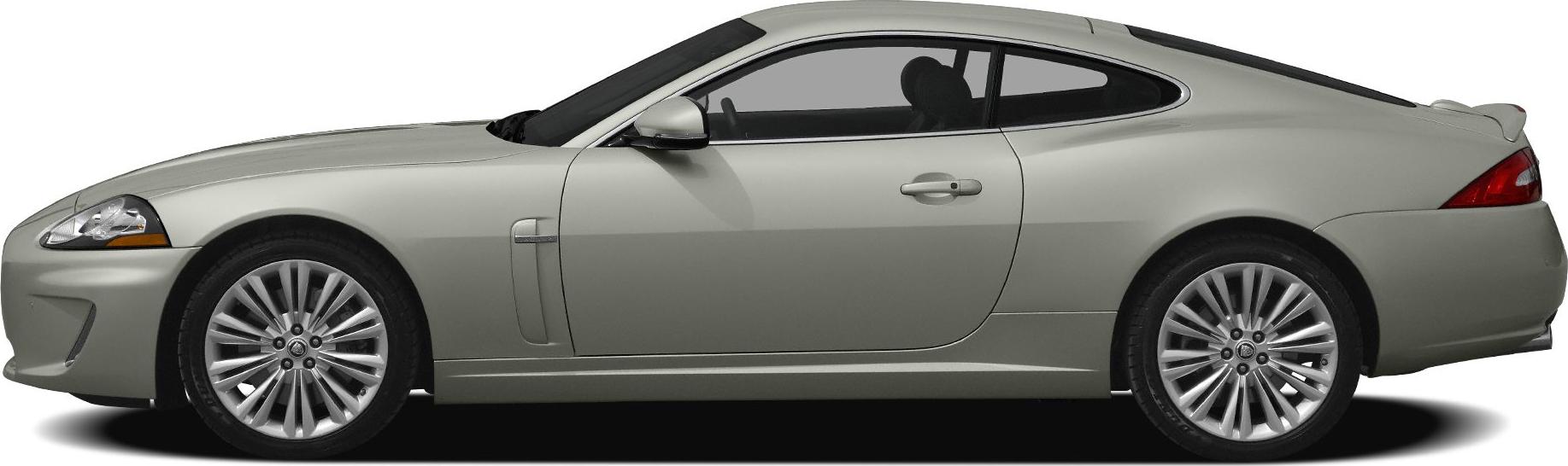 Side profile of a sleek coupe with smooth lines and multi-spoke alloy wheels