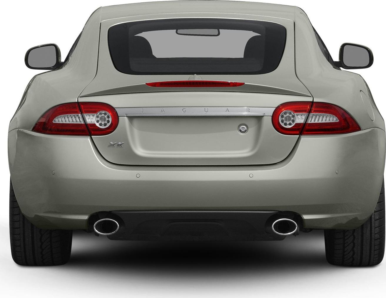 Rear view with dual exhausts and distinctive tail lights