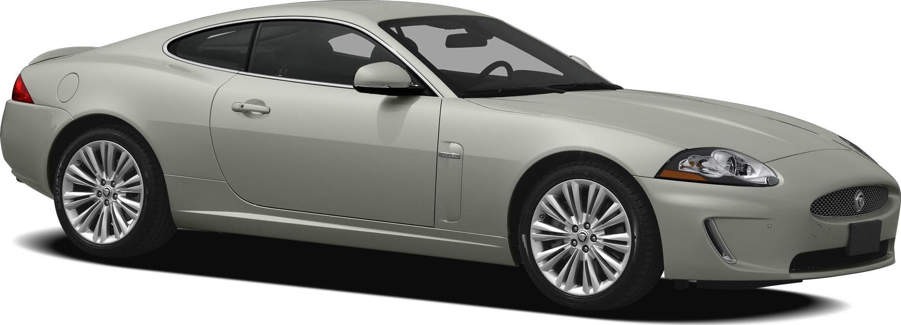 Silver luxury coupe with sleek body and sporty alloy wheels