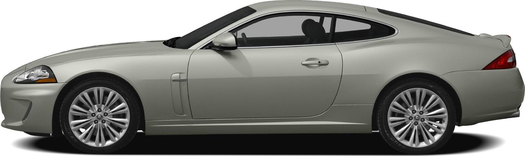 Side profile and detailed alloy wheels of a sleek luxury coupe