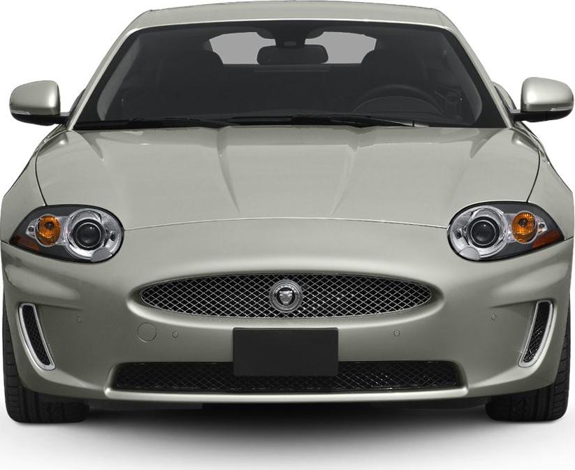 Front view showing grille and distinctive headlights of a coupe.