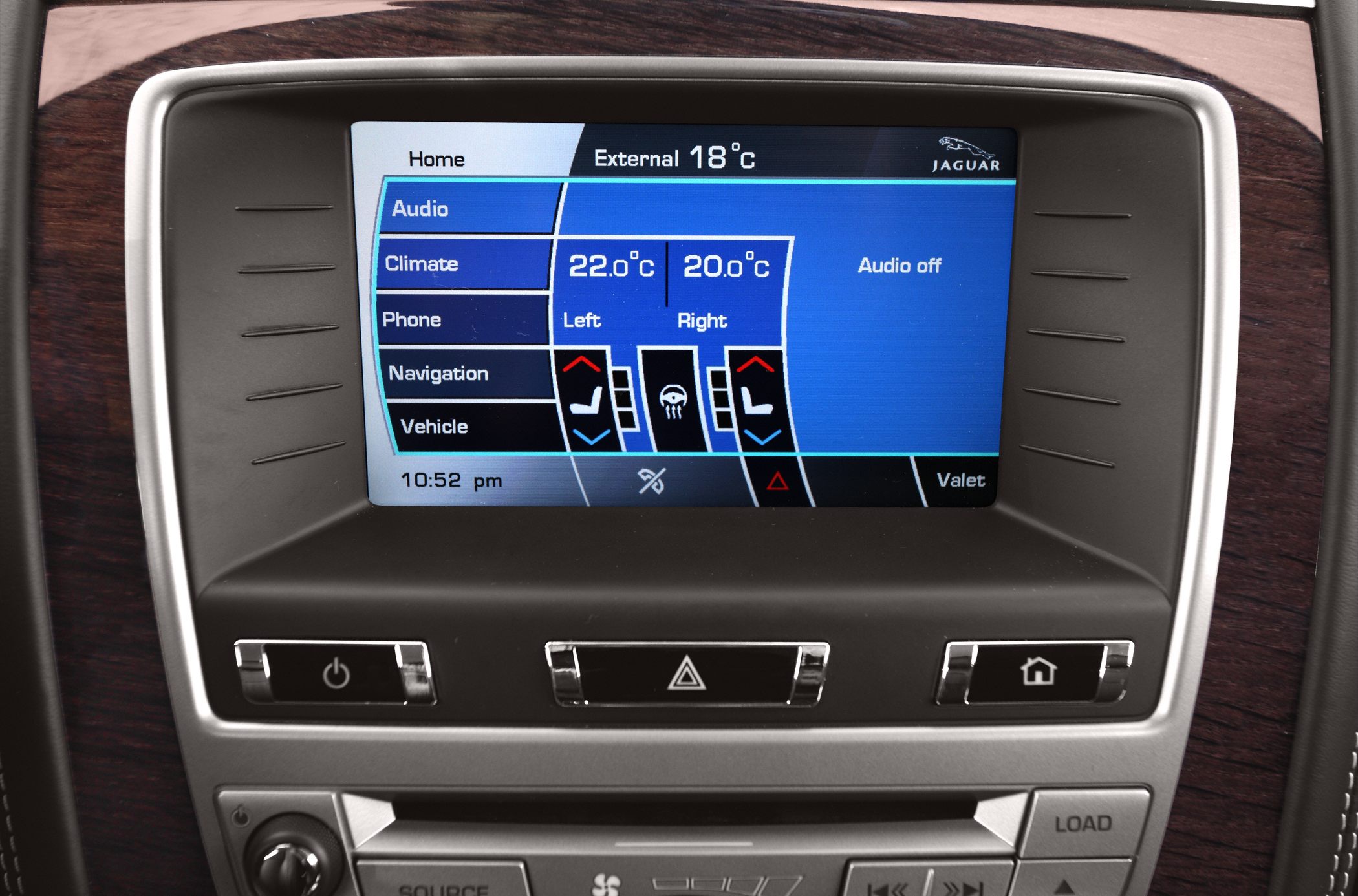 Infotainment touchscreen displaying climate control settings and vehicle menu