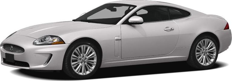 Sleek silver sport coupe with aerodynamic body and distinctive alloy wheels