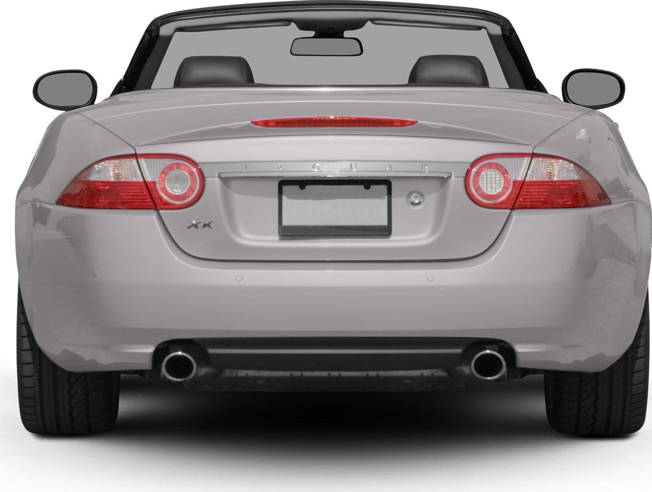 Rear view of convertible with round taillights and dual exhaust