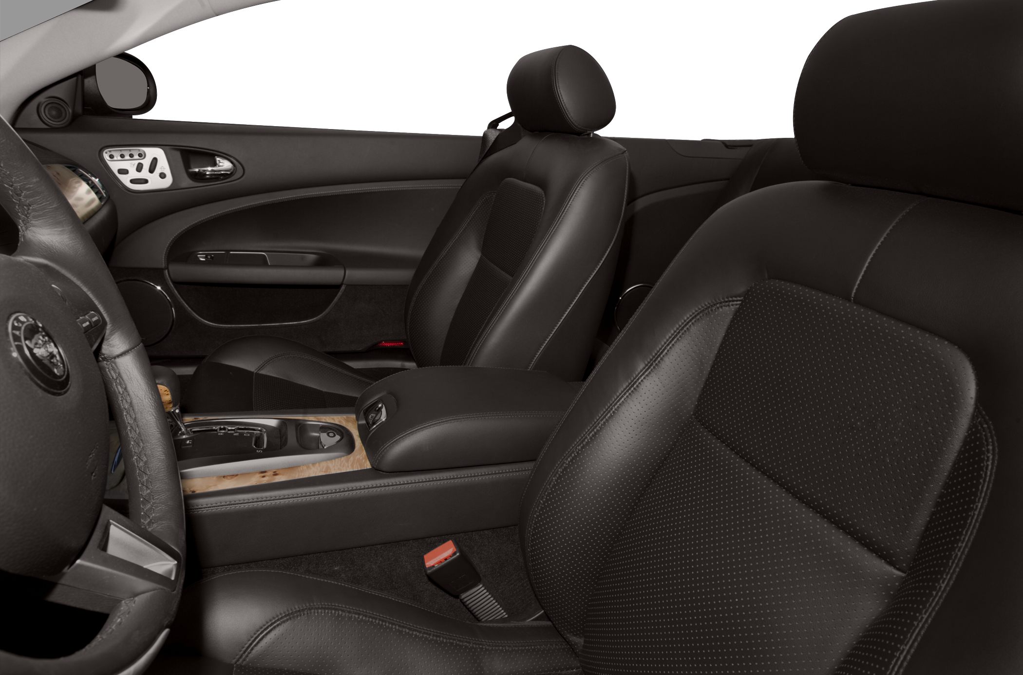 Black leather seats and wood trim with detailed controls in luxury convertible interior