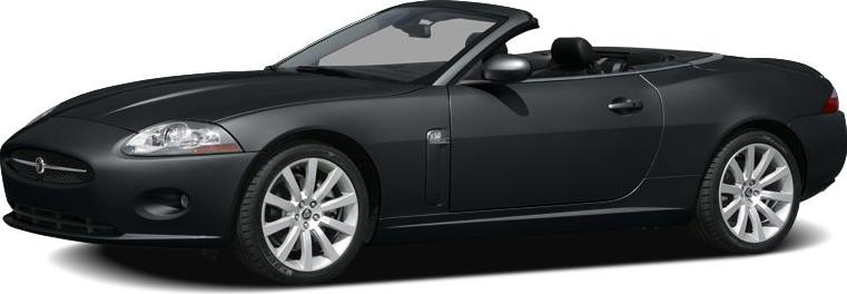 Sleek black luxury convertible roadster with open top and sporty design.