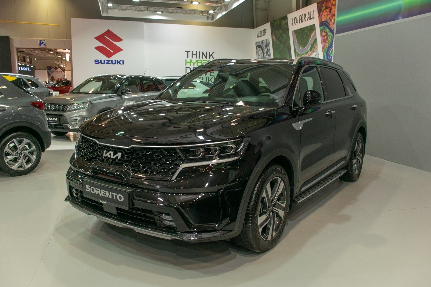 Black SUV front view with distinctive grille and sleek headlights
