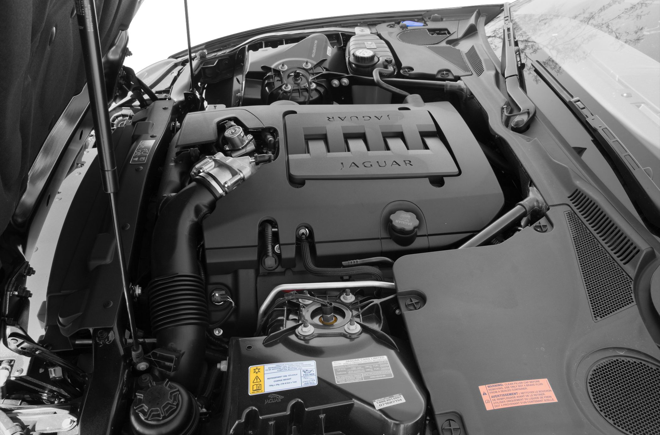 Detailed Jaguar XK Coupe X150 engine bay with components