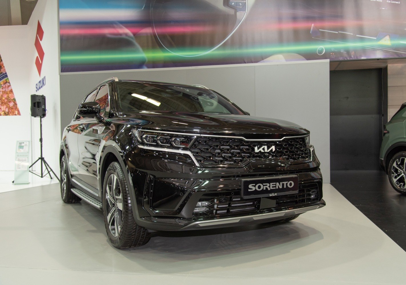 Front view of SUV with honeycomb grille and sleek headlights