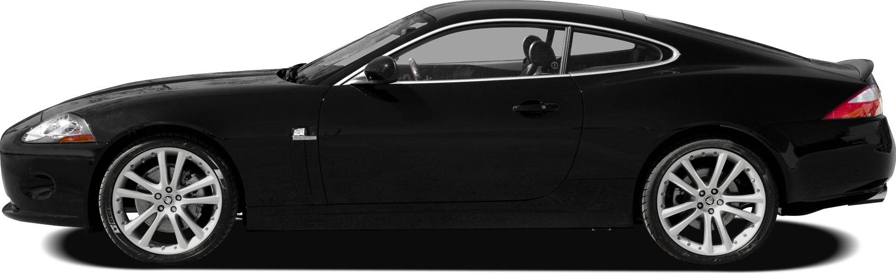 Side profile of a sleek sports coupe with alloy wheels