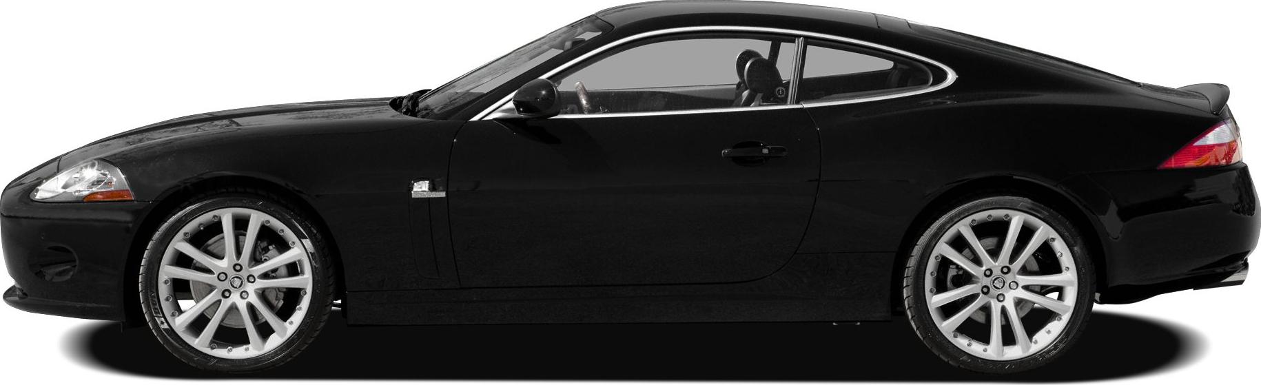 Side profile with sleek roofline and alloy wheels.