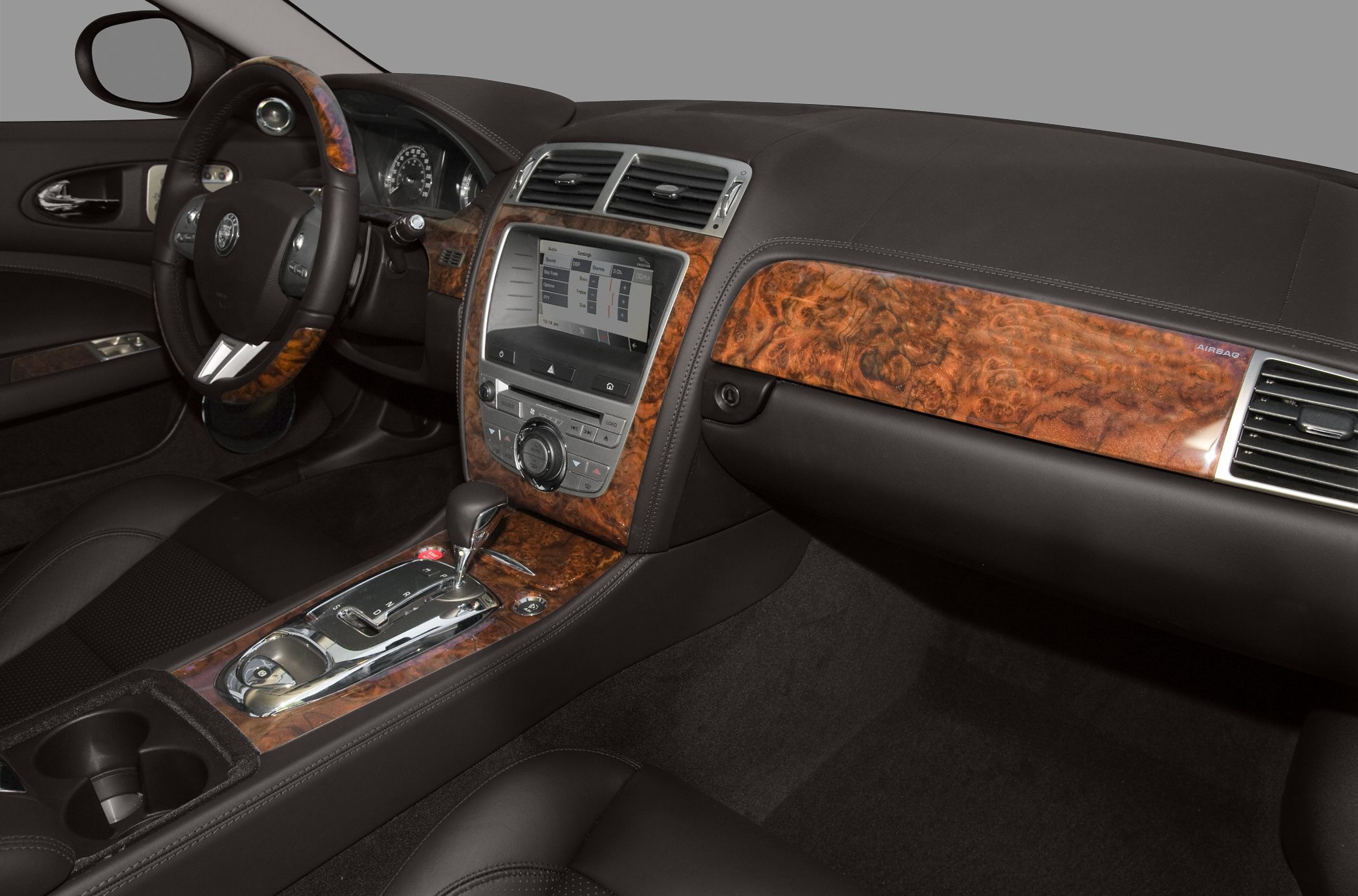 Luxury wood trim dashboard and central console with automatic gear shift