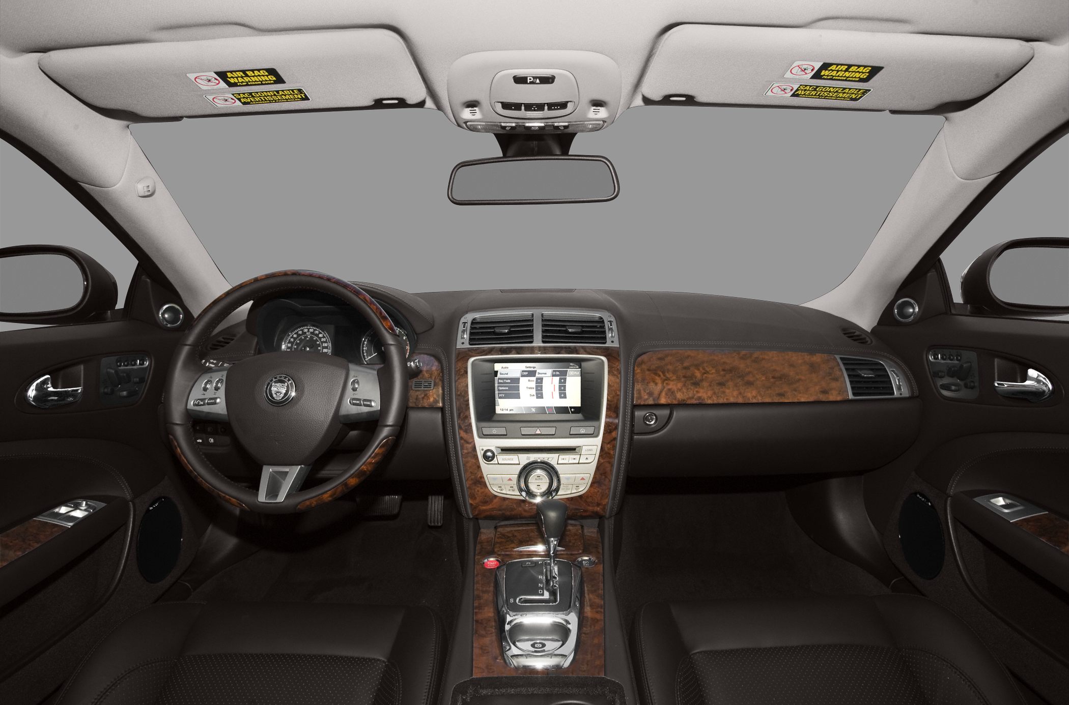 Luxurious dashboard and center console with wood trims and advanced controls