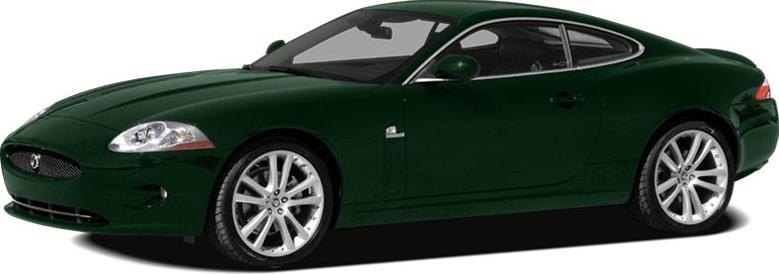 Dark green luxury coupe with sleek aerodynamic profile and alloy wheels