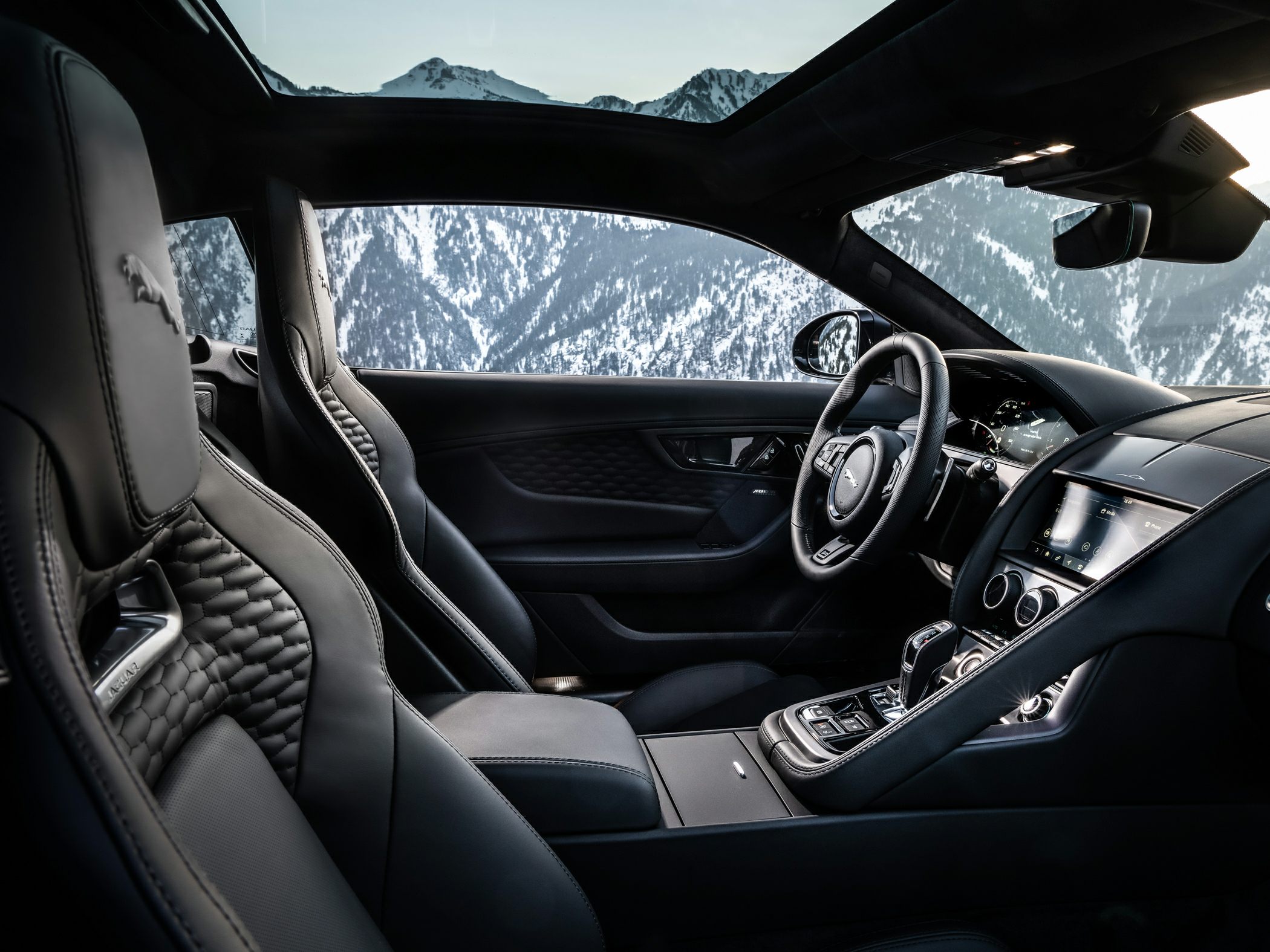 Luxury interior with quilted leather seats and panoramic sunroof