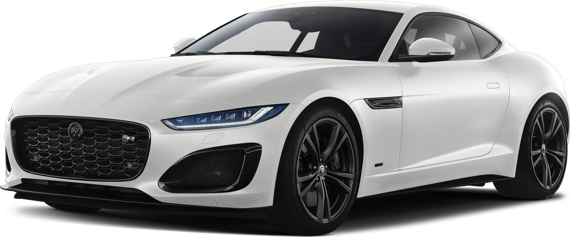 White sports coupe with black grille and sharp LED headlights, front-angle view