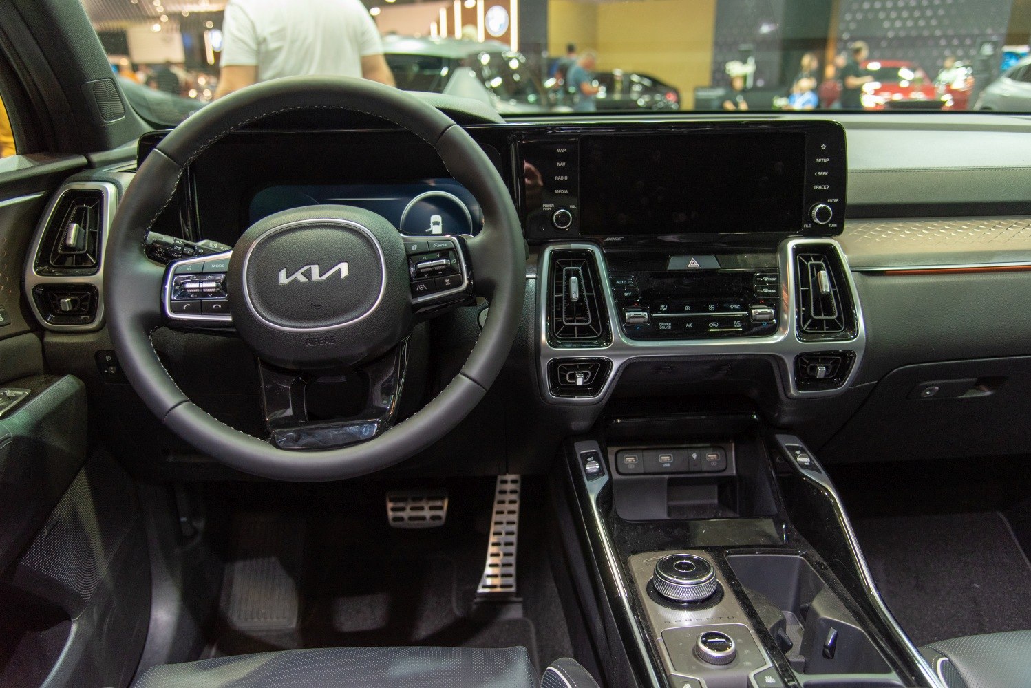Steering wheel with controls and large touchscreen dashboard