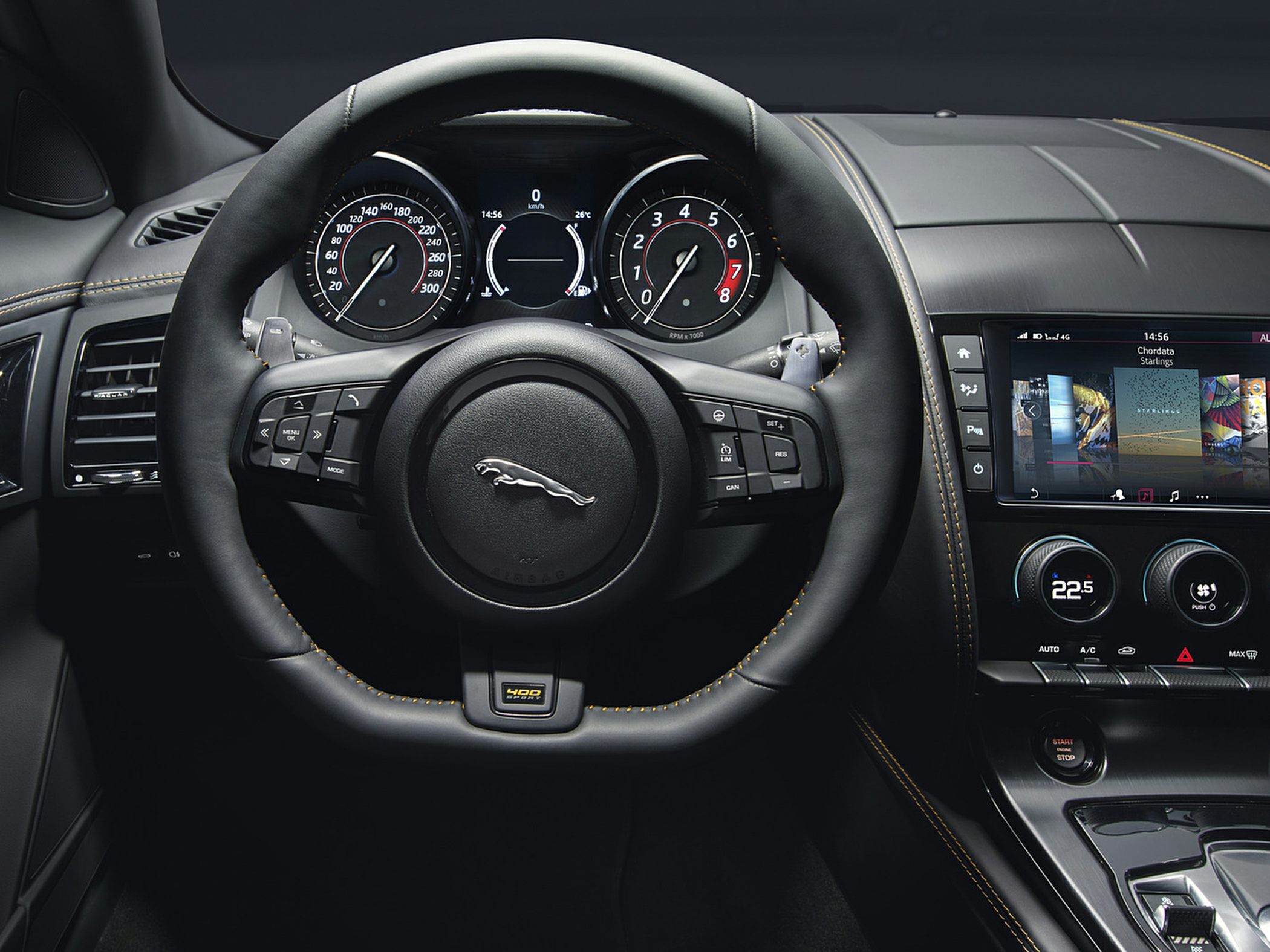 Sports steering wheel with digital cluster and infotainment system