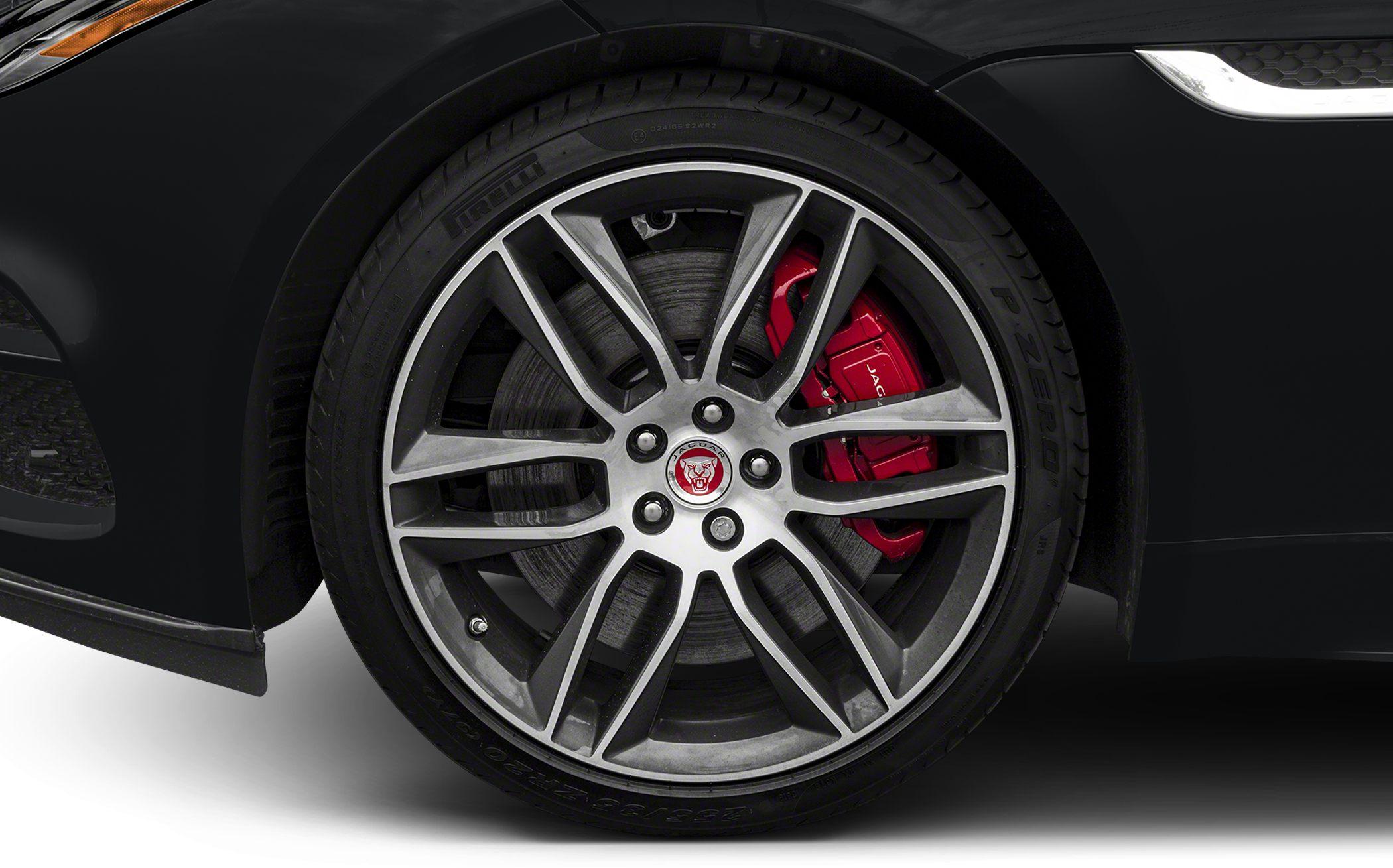 Alloy wheel and red brake caliper close-up
