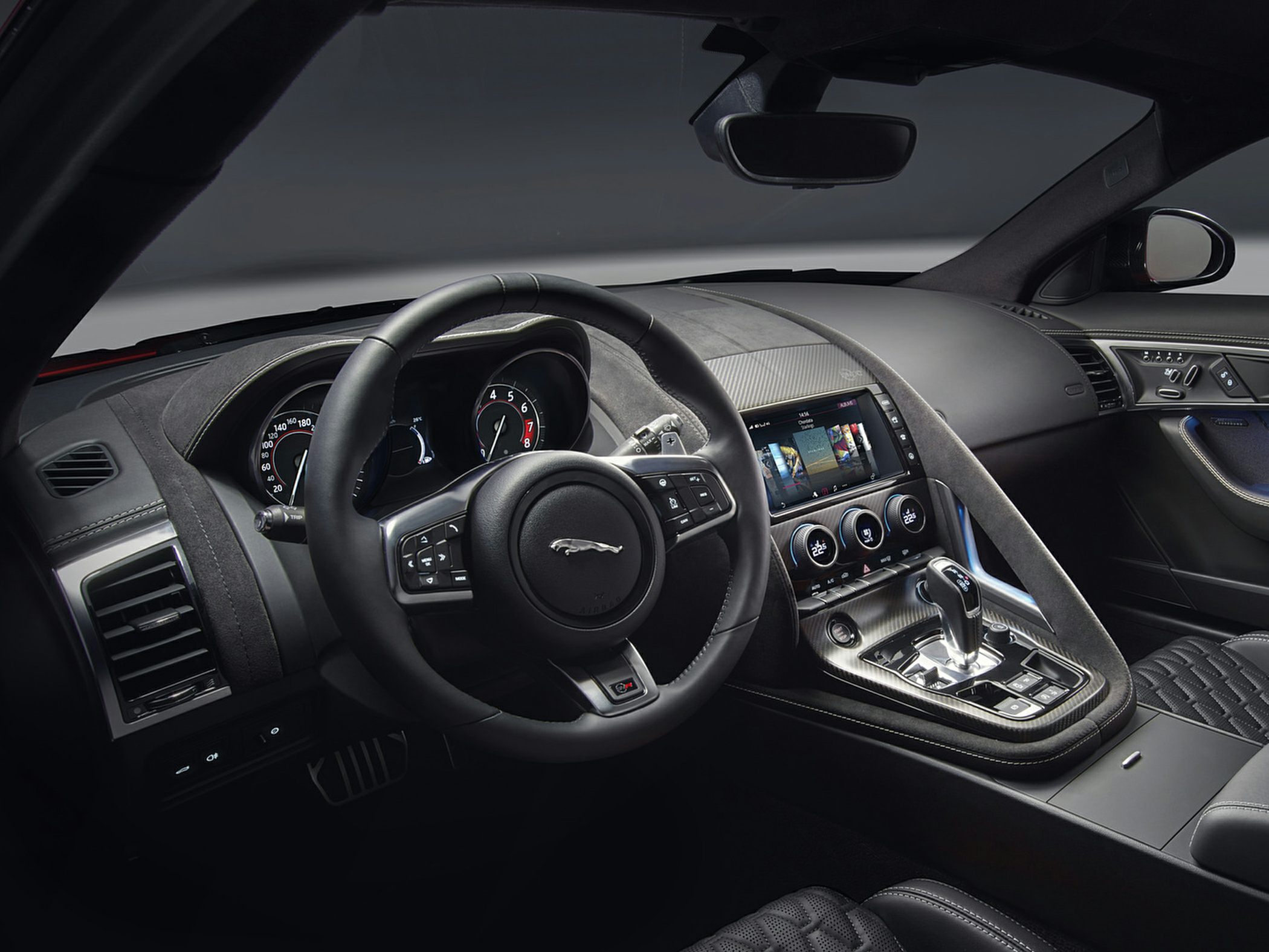 Luxury cockpit with digital dashboard and infotainment system.