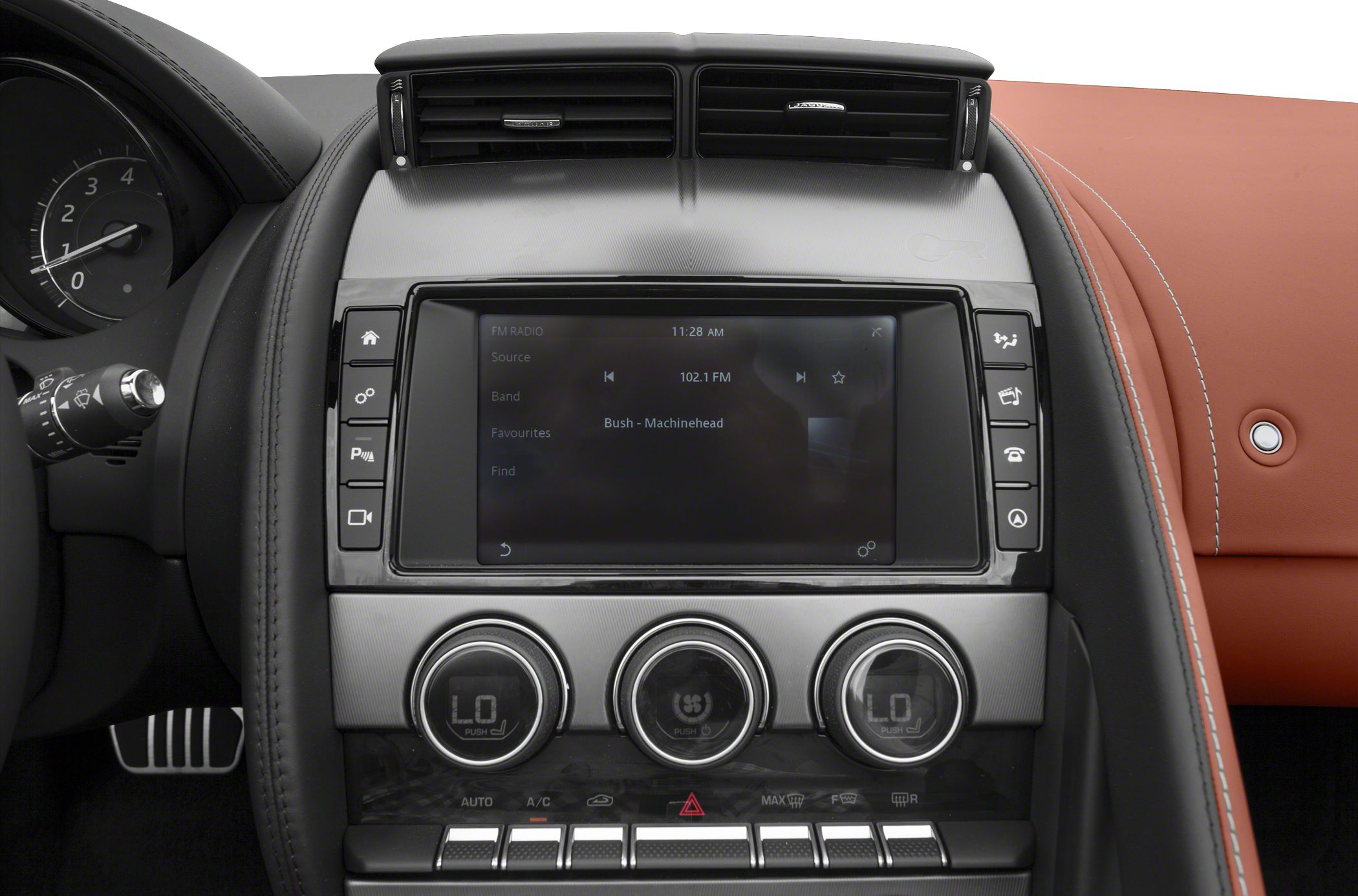 Infotainment touchscreen and climate control knobs with air vents.