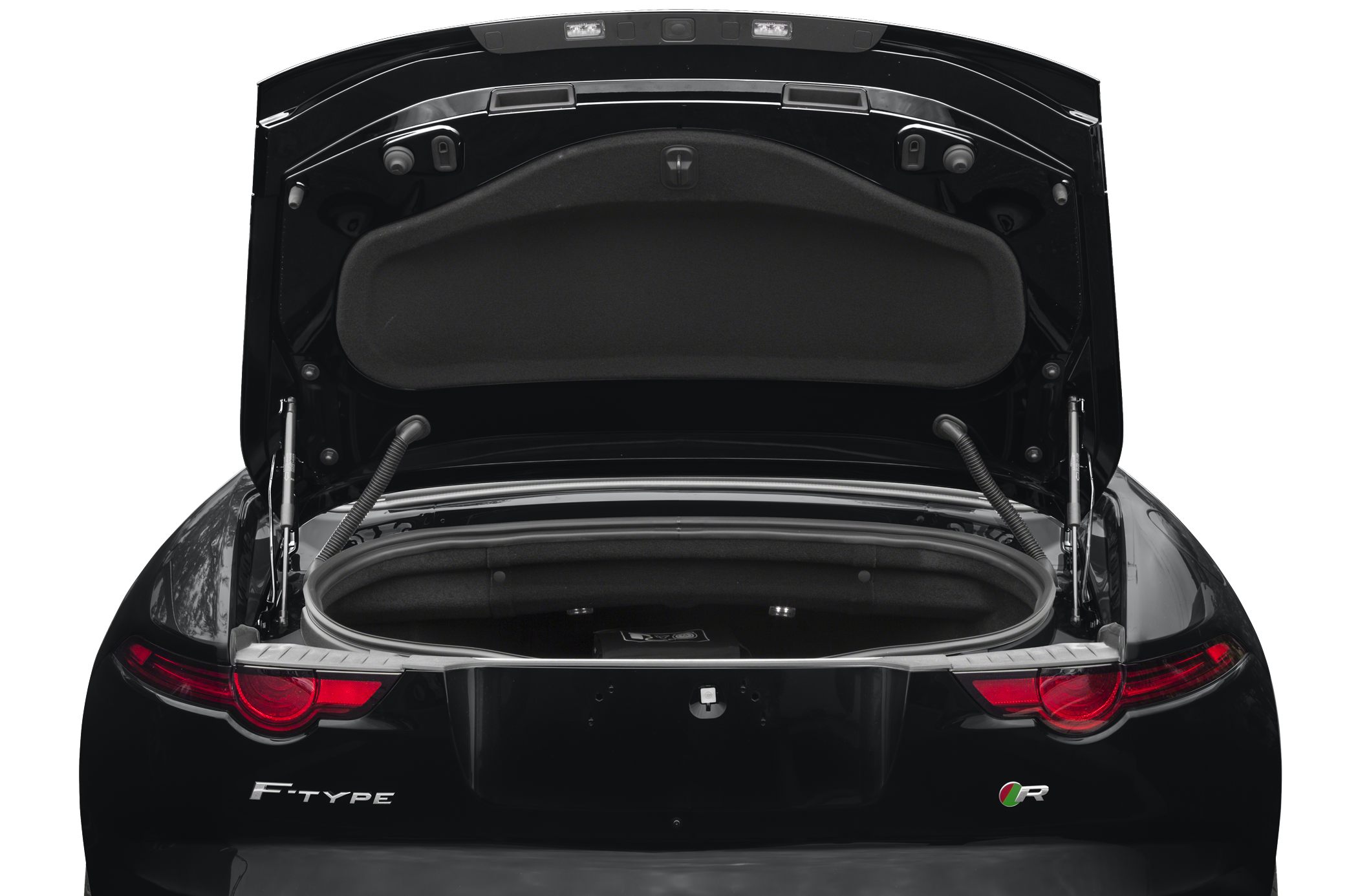 Open rear trunk with visible storage space and hinges
