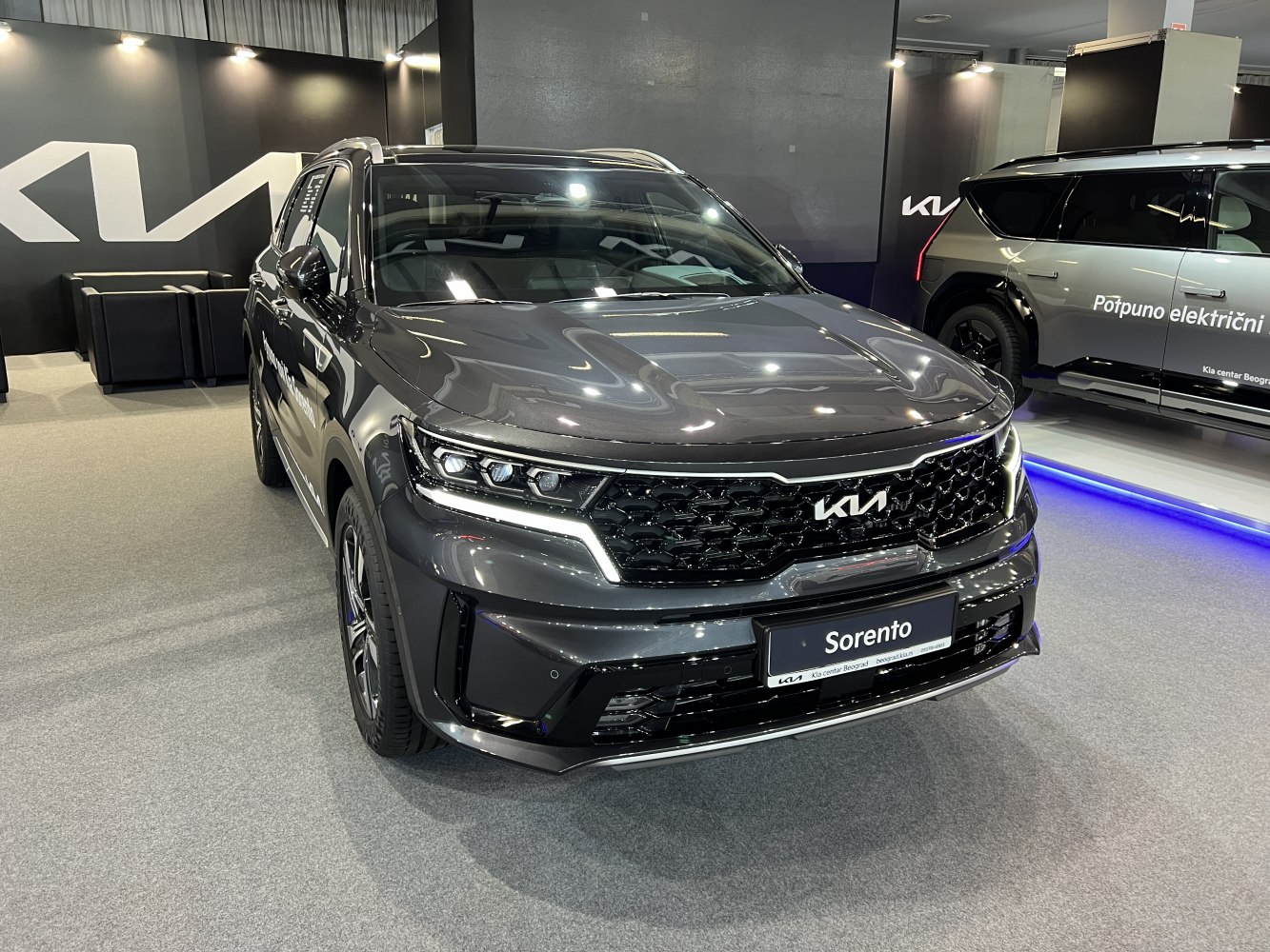 Front view with signature grille and LED headlights