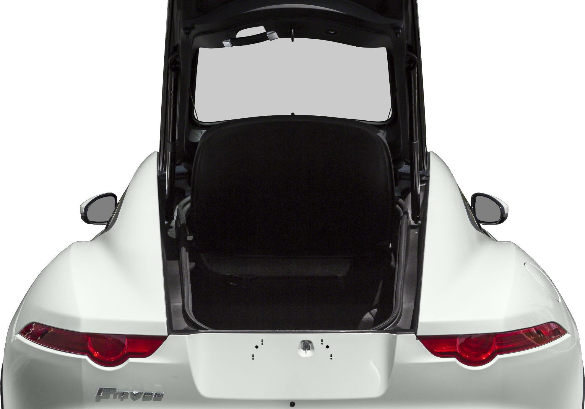 Rear view with open trunk and distinctive tail lights of a luxury coupe.