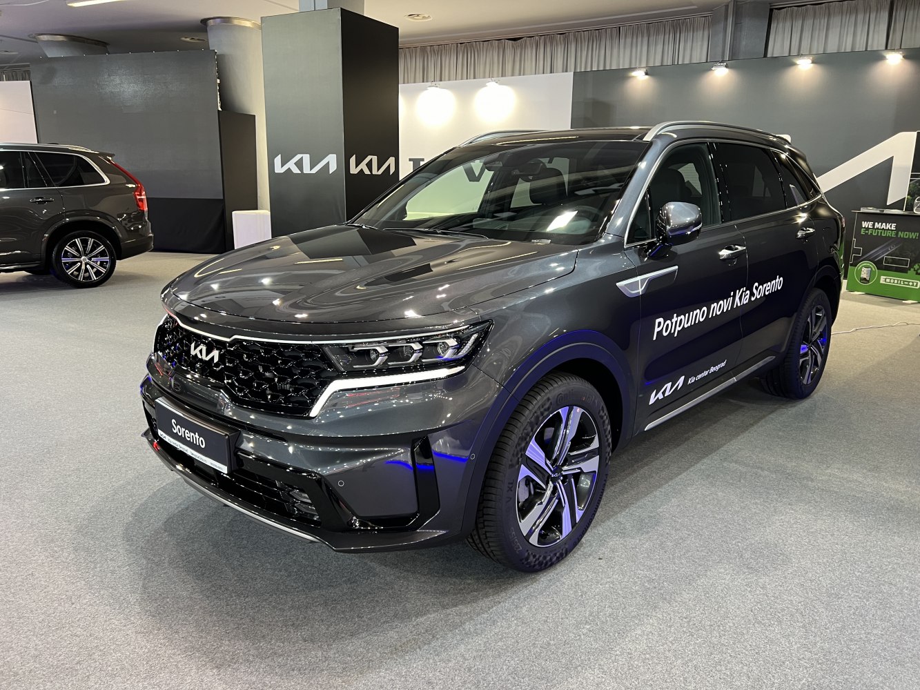 Front angled view with LED headlights and alloy wheels